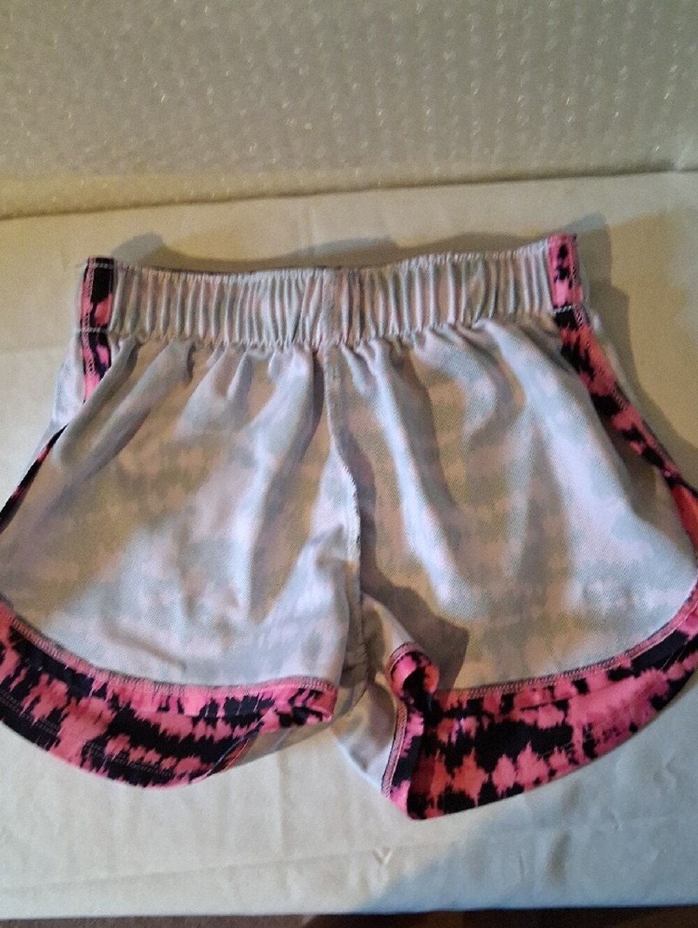 Under Armour Pink and Black Printed Women’s Athletic Shorts - Picture 4 of 8